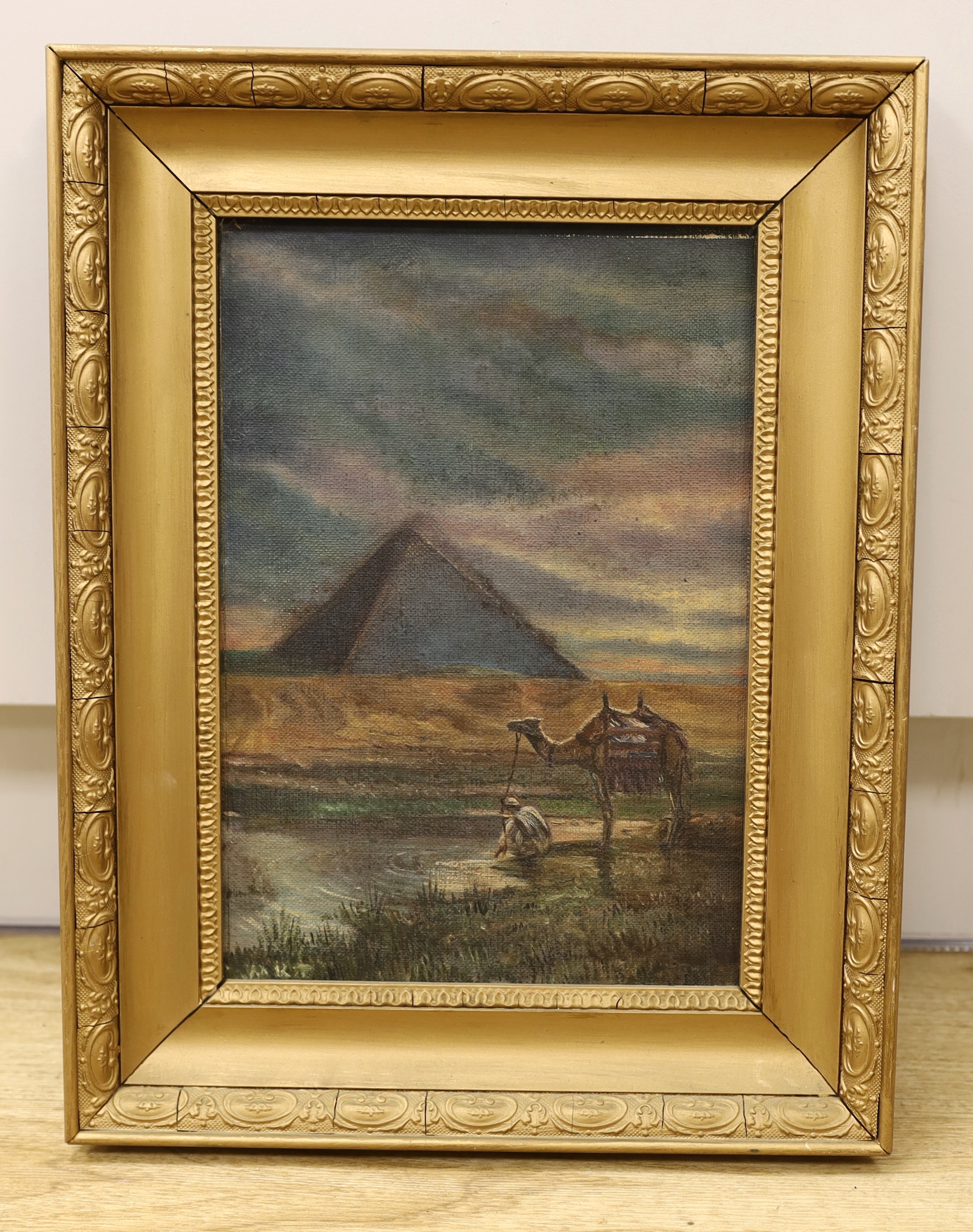 Early 20th century, oil on canvas, Figure and camel before a pyramid, 32 x 22cm